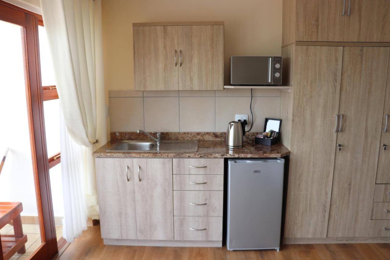 Aquamarine pensión Mossel Bay Habitación foto